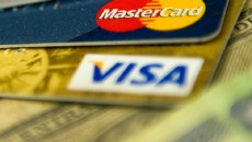 Visa и MasterCard отключили от обслуживания ряд банков РФ